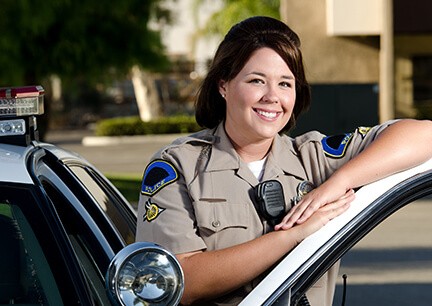 female police officer smiling